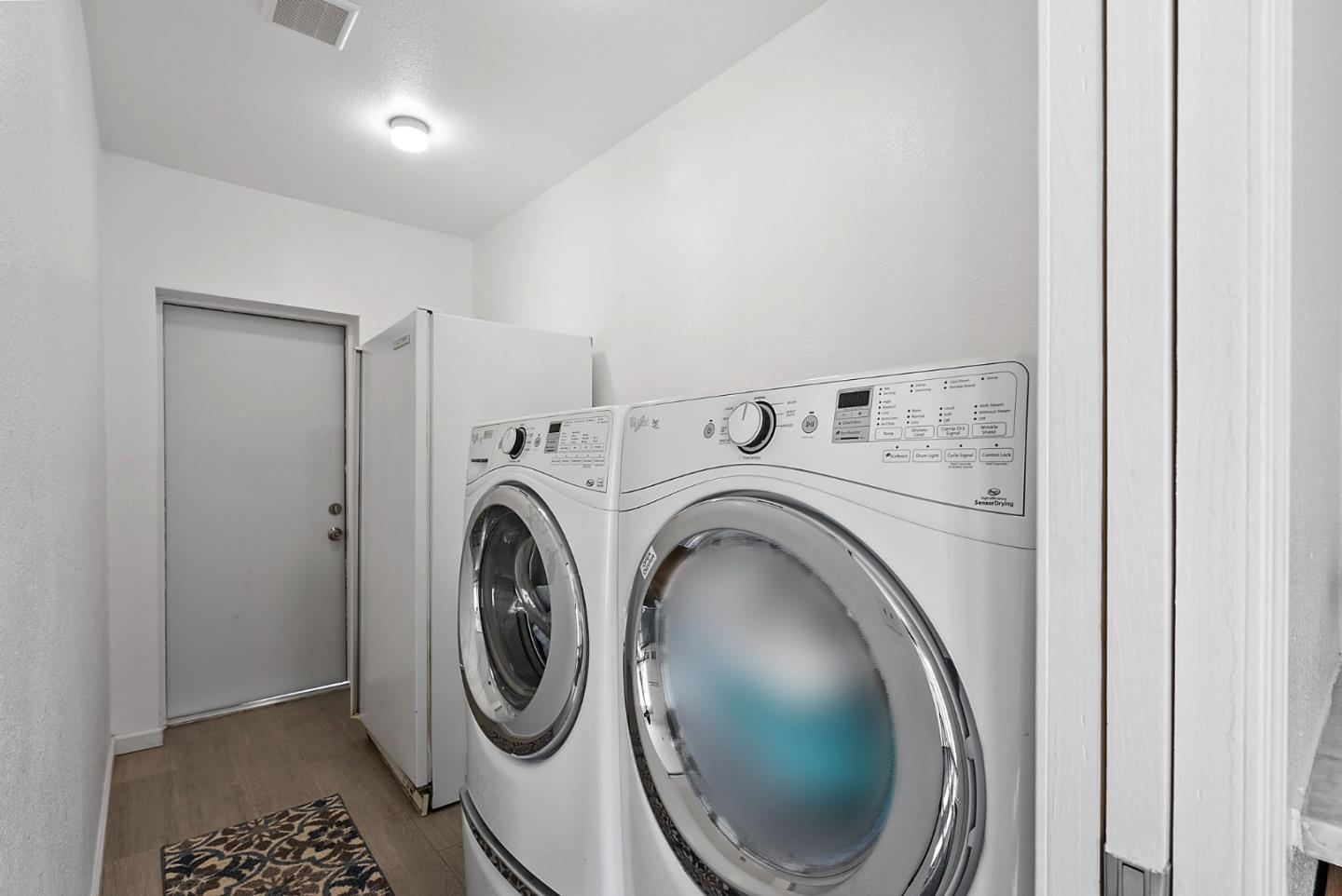 254 Uvas Street Milpitas, CA 95035 - Photo 30 of 48 a utility room with dryer and washer