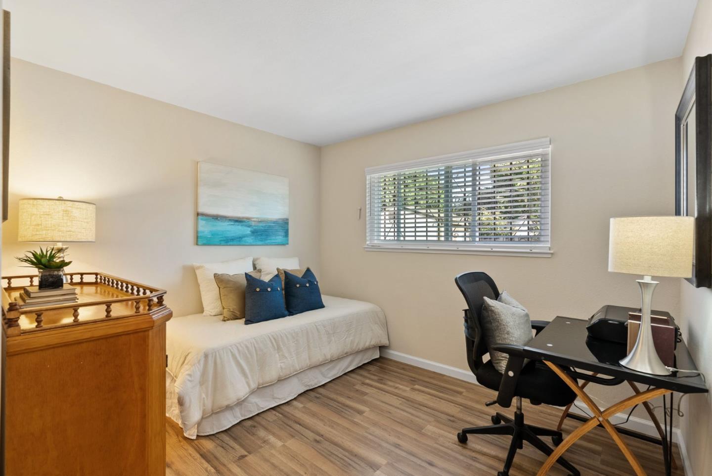 254 Uvas Street Milpitas, CA 95035 - Photo 33 of 48 a bedroom with a bed and wooden floor