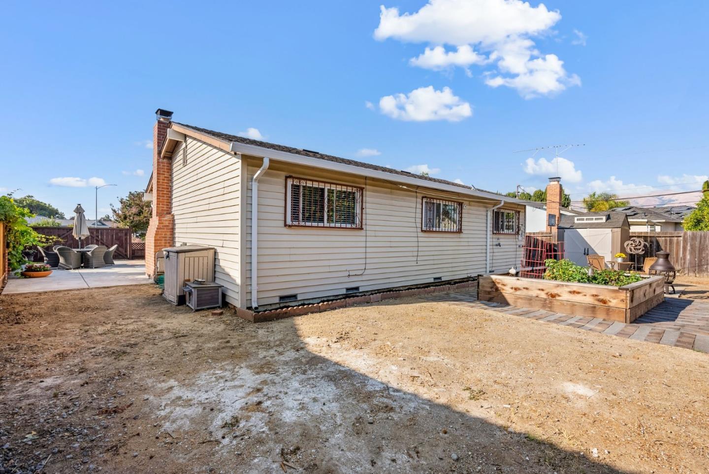 254 Uvas Street Milpitas, CA 95035 - Photo 40 of 48 a view of a house with backyard and sitting area