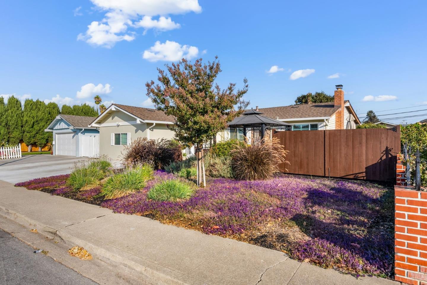 254 Uvas Street Milpitas, CA 95035 - Photo 4 of 48 a view of a house with a street