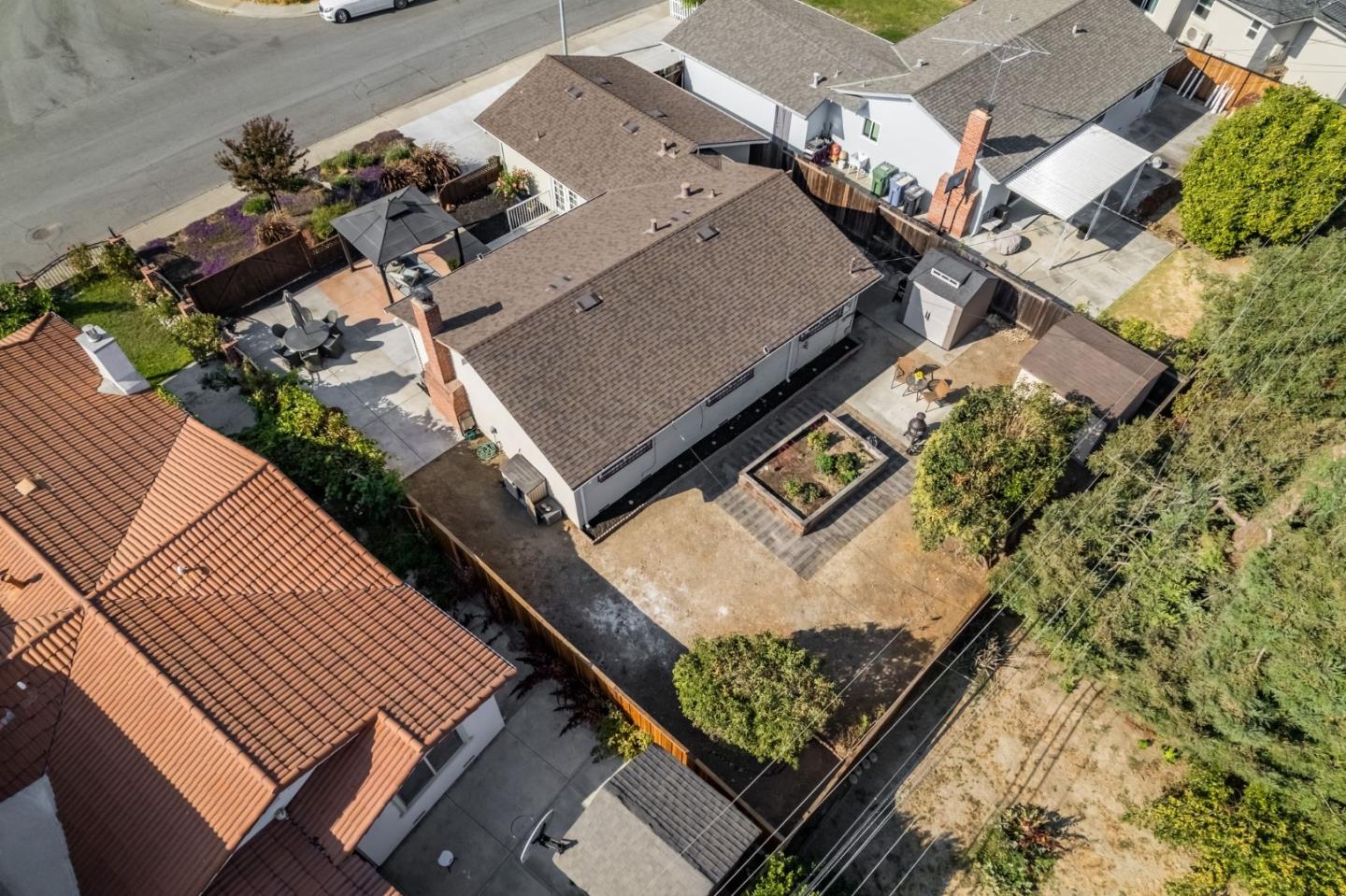 254 Uvas Street Milpitas, CA 95035 - Photo 42 of 48 an aerial view of a residential apartment building with a yard