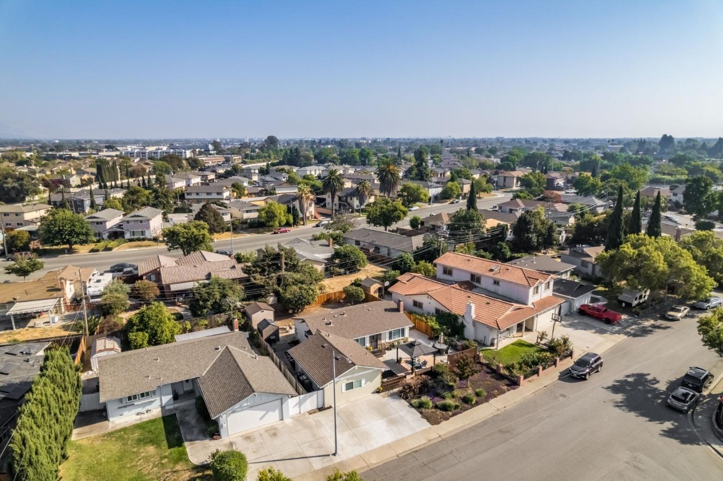 254 Uvas Street Milpitas, CA 95035 - Photo 44 of 48 an aerial view of a city with lots of residential buildings