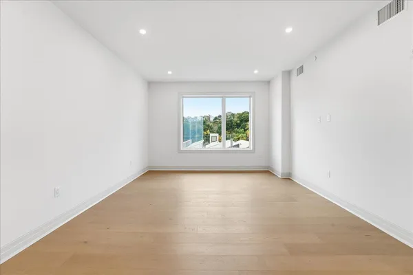 a view of a livingroom with furniture and window