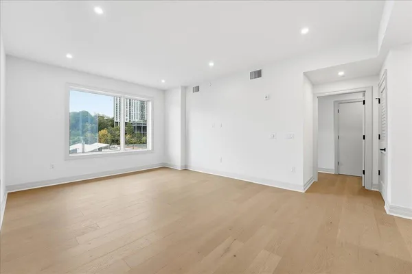 a view of a living room and entry way