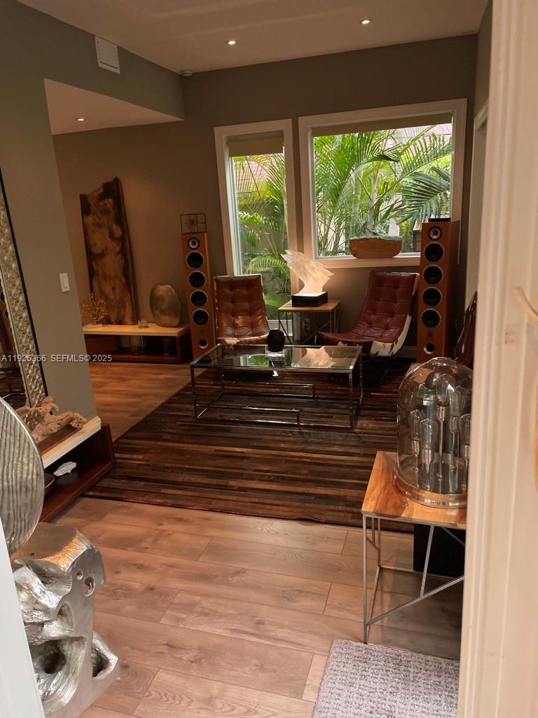 2654 Southwest 25th Terrace Miami, FL 33133 - Photo 14 of 36 a living room with furniture and a floor to ceiling window