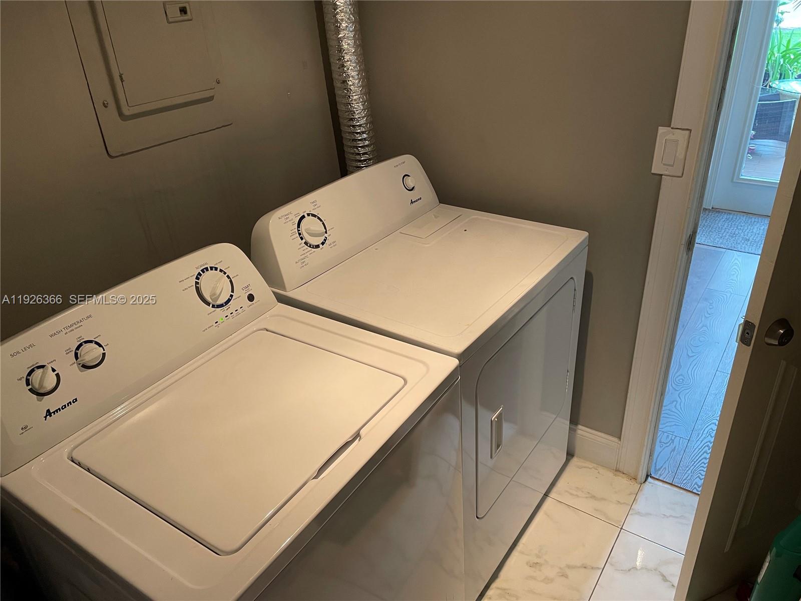 2654 Southwest 25th Terrace Miami, FL 33133 - Photo 26 of 36 a utility room with dryer and washer