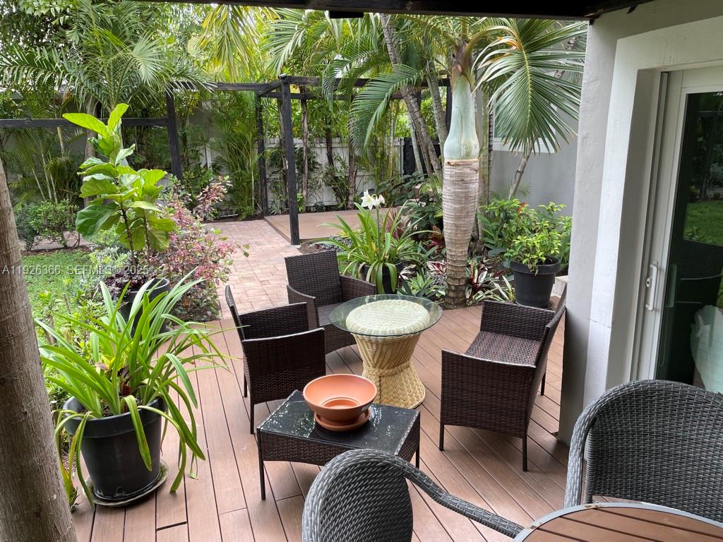 2654 Southwest 25th Terrace Miami, FL 33133 - Photo 35 of 36 a outdoor living room with furniture