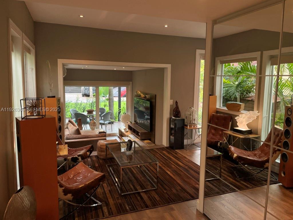 2654 Southwest 25th Terrace Miami, FL 33133 - Photo 4 of 36 a view of a living room and a balcony
