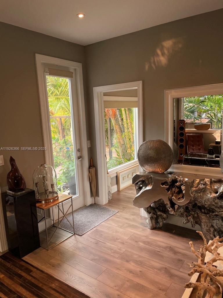 2654 Southwest 25th Terrace Miami, FL 33133 - Photo 7 of 36 a view of a workspace with furniture and a window