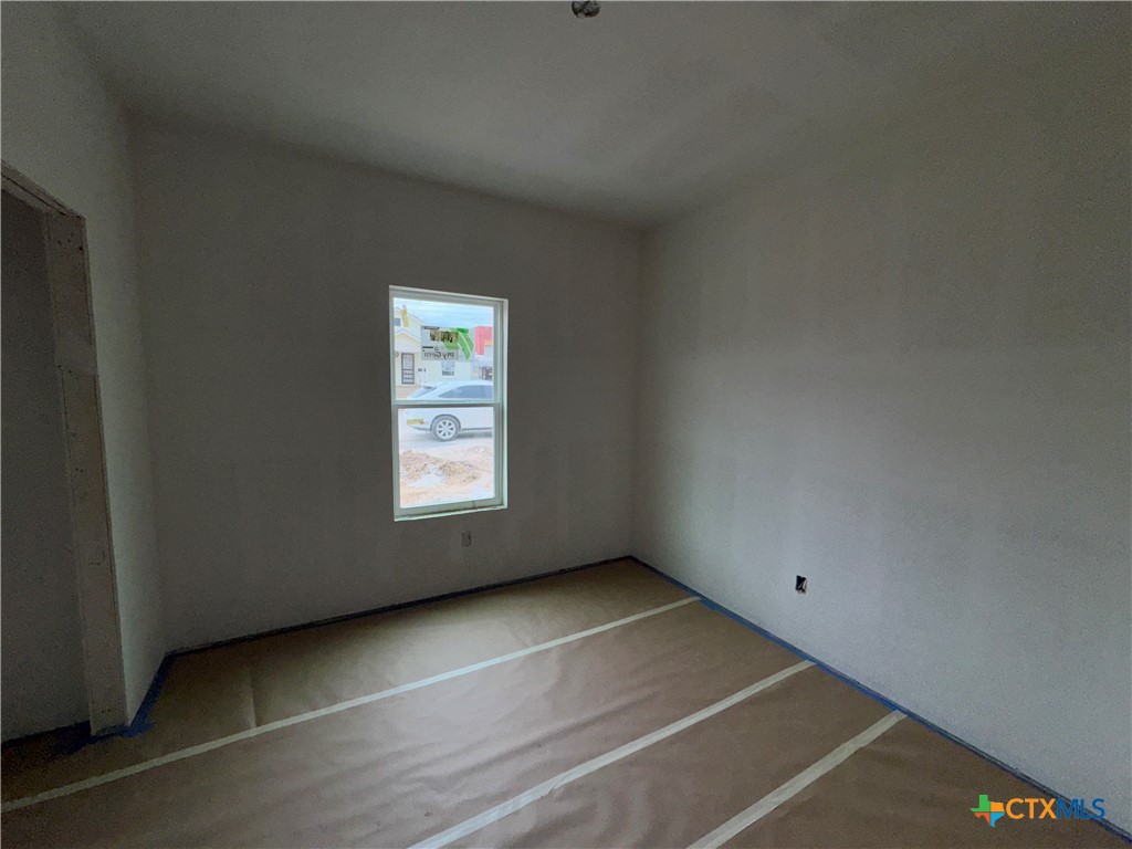 606 Bridge Street Gatesville, TX 76528 - Photo 10 of 14 a view of an empty room with a window