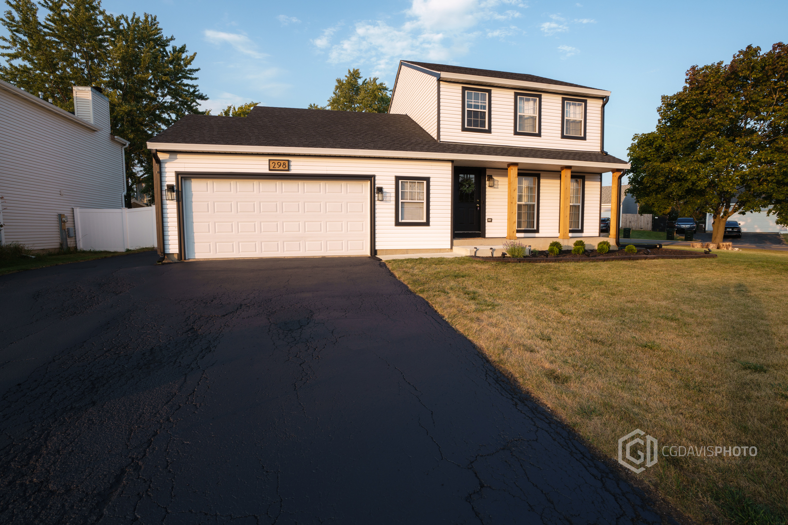 298 Eagle Creek Drive Round Lake Beach, IL 60073 - Photo 1 of 1 a front view of a house with a yard