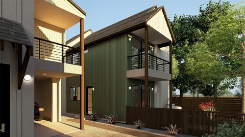 a view of a house with a yard and tree s