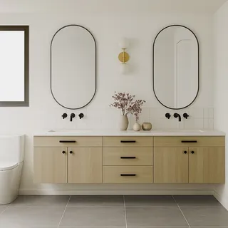 a bathroom with a sink a mirror and a potted plant