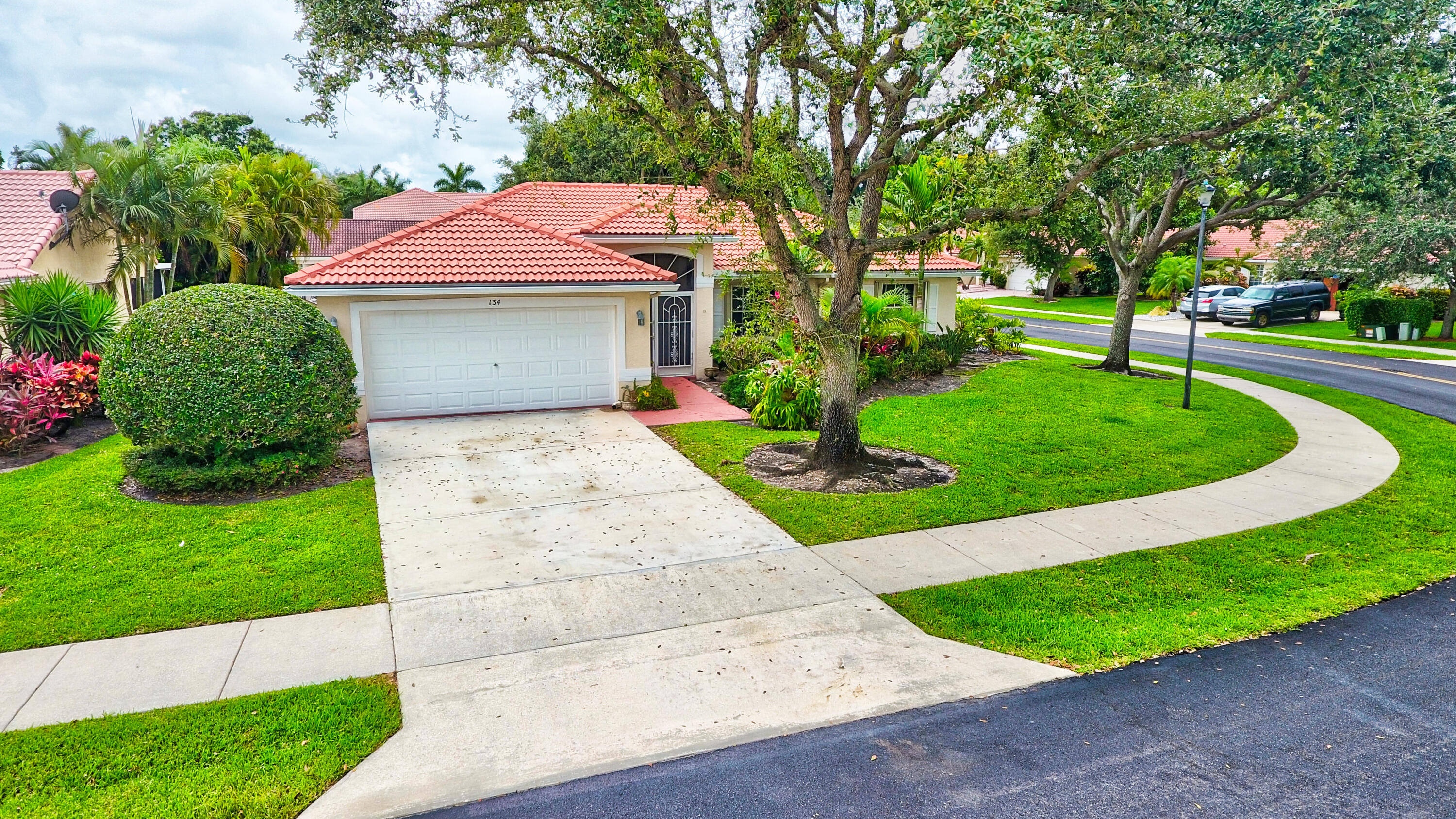 134 East Lee Road Delray Beach, FL 33445 - Photo 1 of 47 Welcome Home East facing front