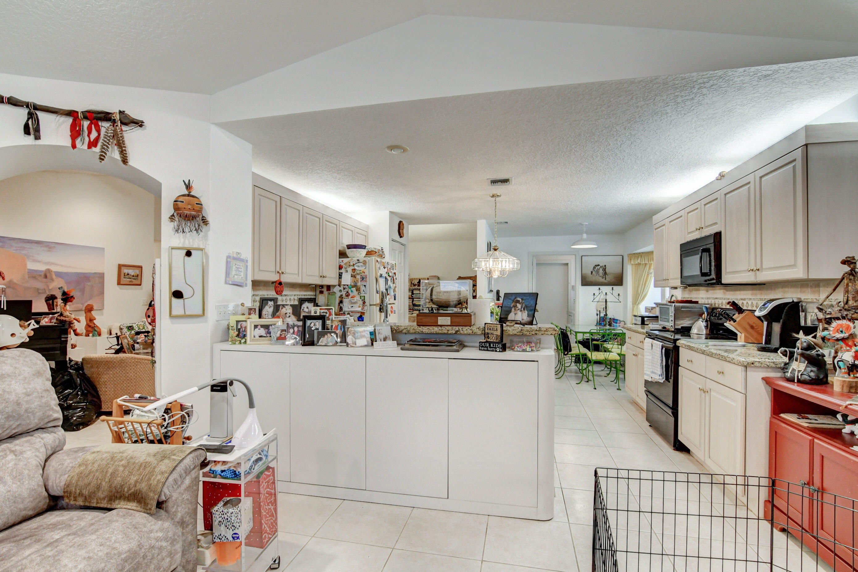 134 East Lee Road Delray Beach, FL 33445 - Photo 19 of 47 Family room opens to kitchen