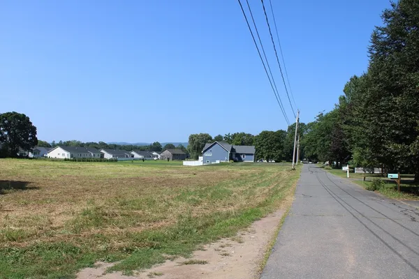 a view of a road with an ocean view