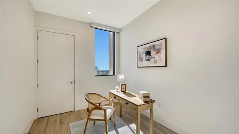 a workspace with a desk and chair