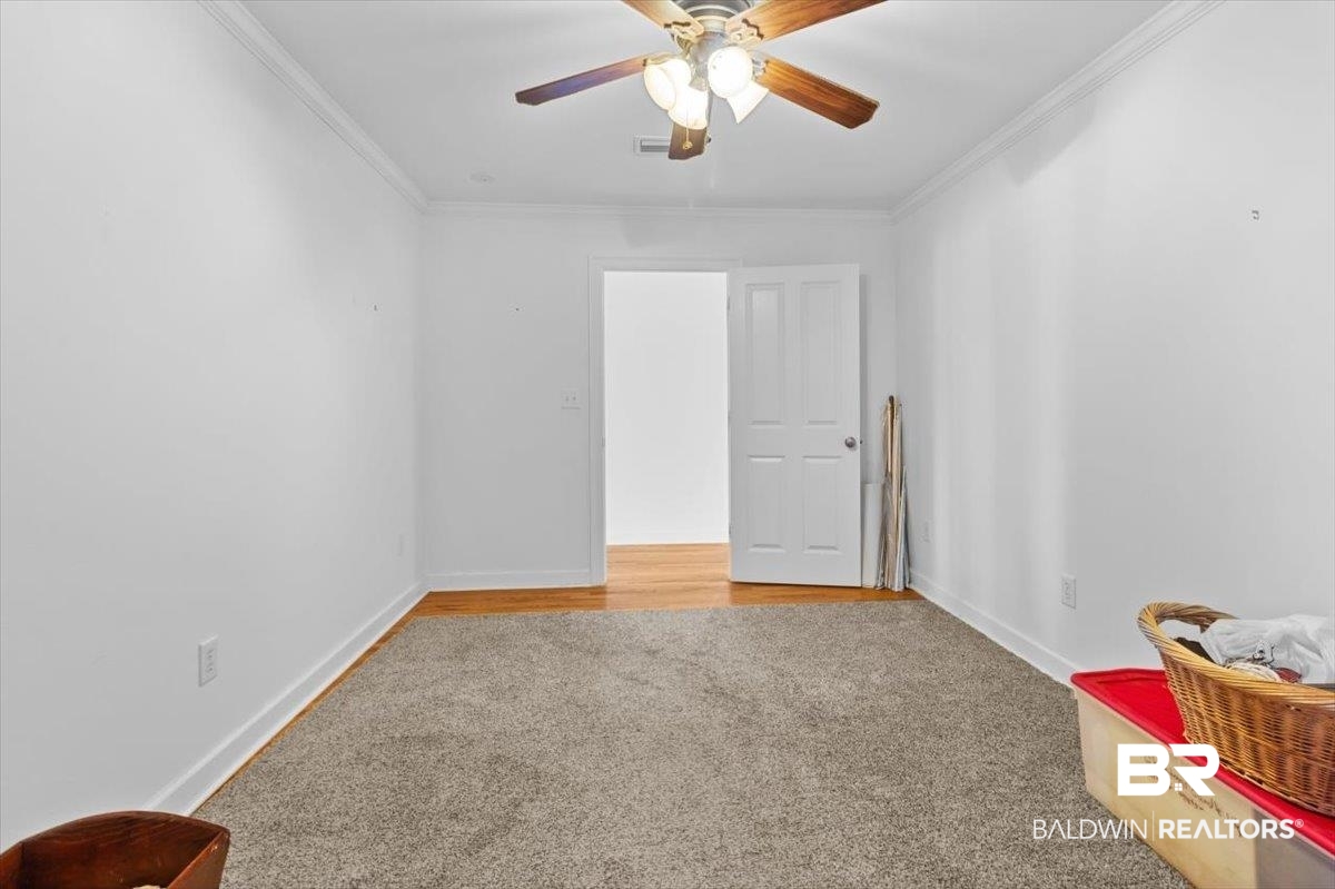 14903 County Road 13 Fairhope, AL 36532 - Photo 22 of 44 This is an interior room with no windows that divides both sides.