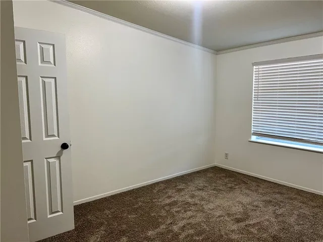 a view of a room with a window