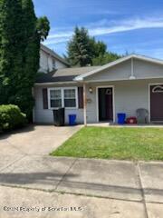 a view of a house with a patio
