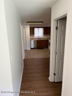 310 New York Street Scranton, PA 18509 - Photo 4 of 10 a view of an empty room with wooden floor and a window