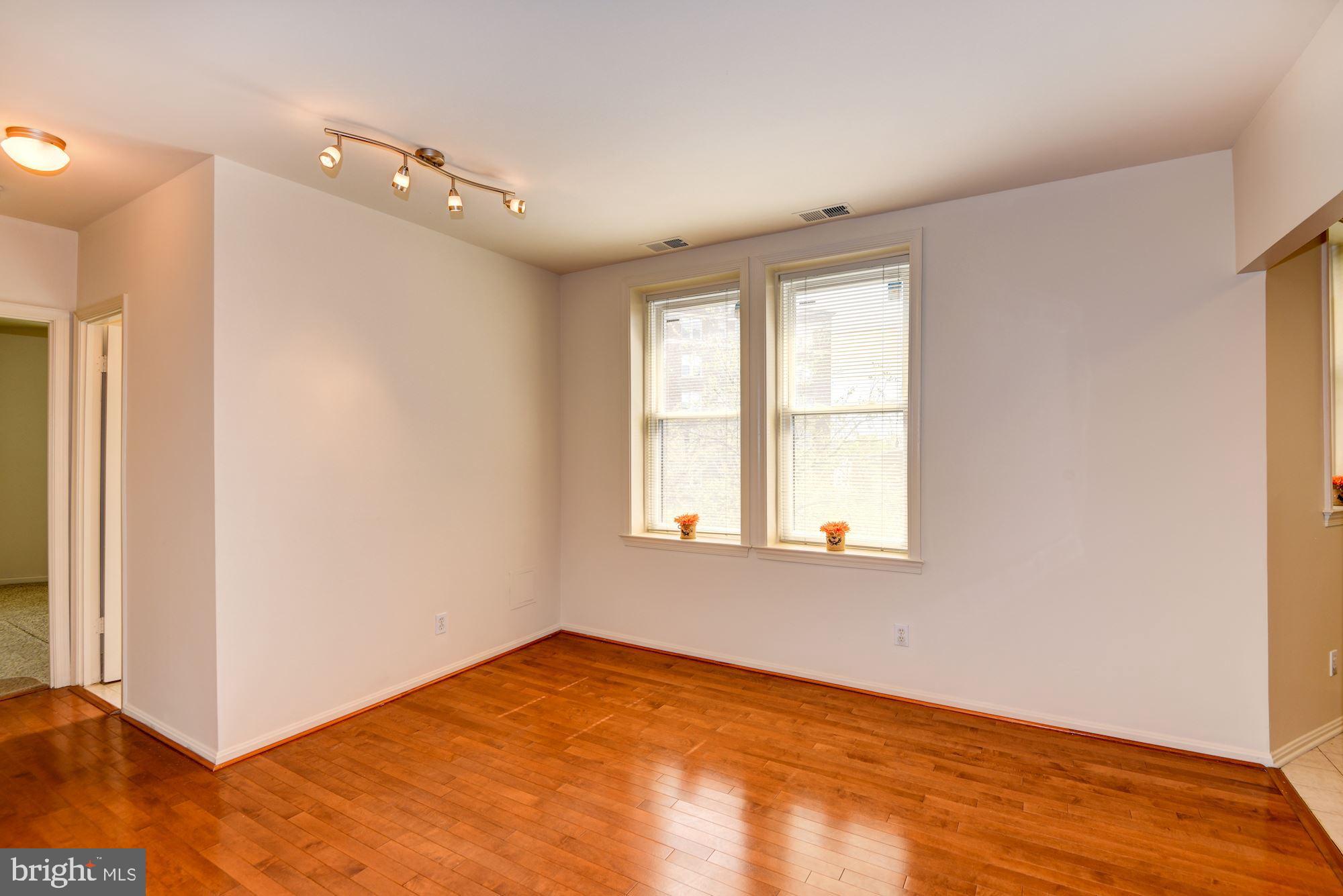 2001 16th Street Northwest, Unit 404 Washington, DC 20009 - Photo 8 of 35 Warm gleaming hardwood floor