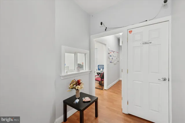 a very nice looking room with wooden floor