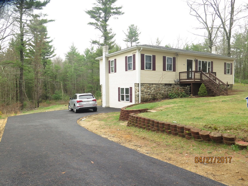 16 Mashapaug Road Sturbridge, MA 01566 - Photo 1 of 26 a view of a house with swimming pool and a yard