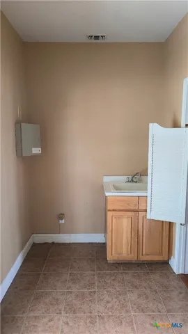 a room with storage and utility