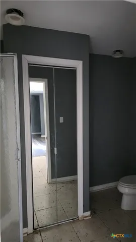 a view of a lake with a yard