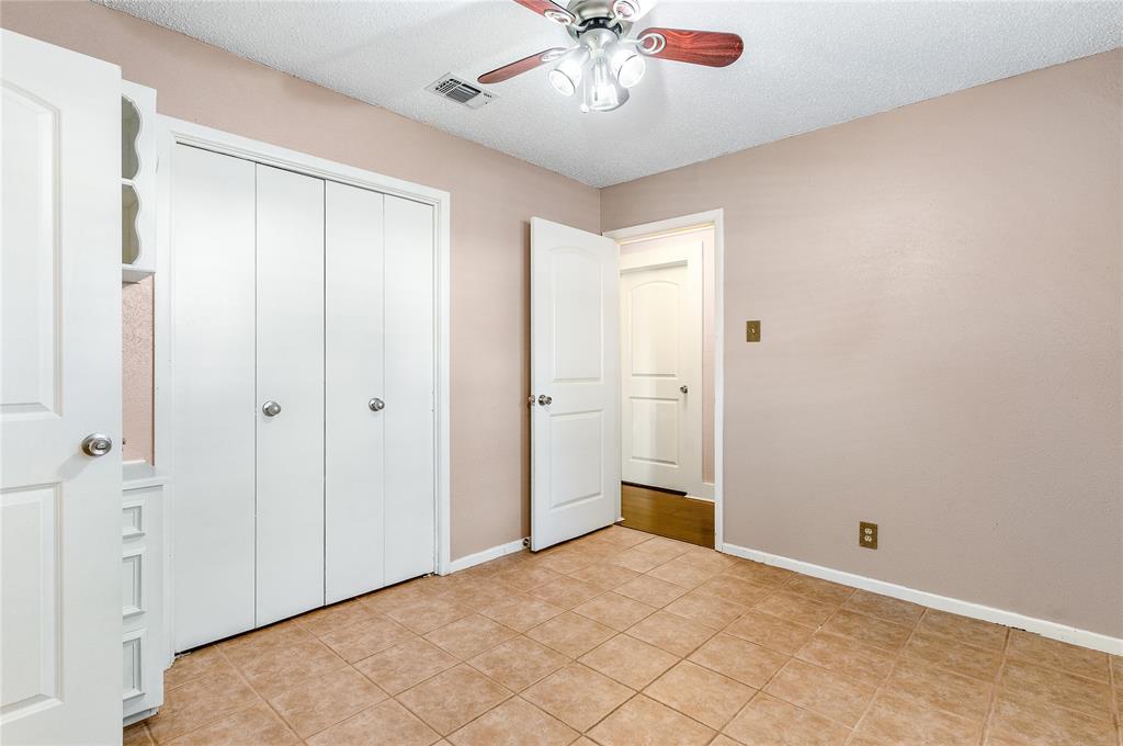 203 Walnut Way Euless, TX 76039 - Photo 19 of 36 a view of an empty room