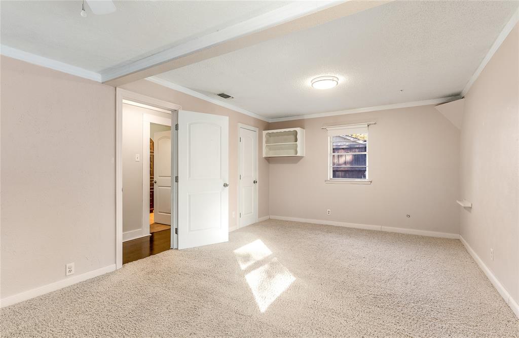 203 Walnut Way Euless, TX 76039 - Photo 20 of 36 a view of an empty room with a window