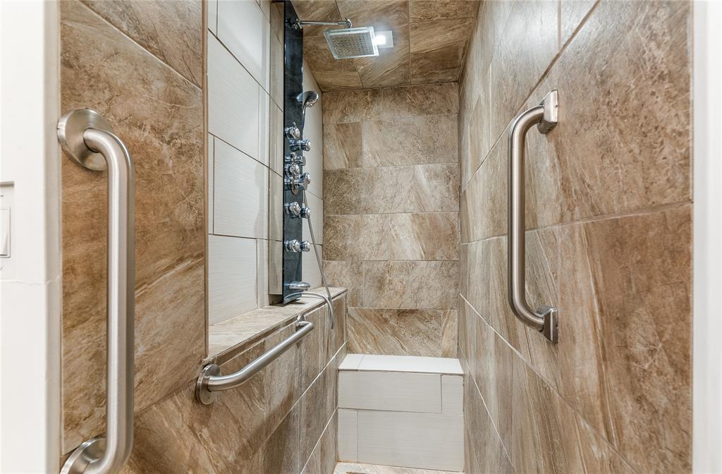 203 Walnut Way Euless, TX 76039 - Photo 23 of 36 a bathroom with a shower