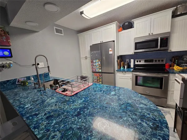 a view of a kitchen sink