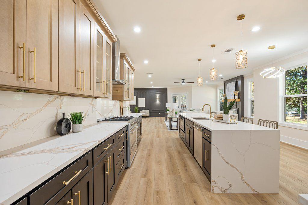 1755 Snapfinger Road Decatur, GA 30032 - Photo 11 of 52 a kitchen with kitchen island granite countertop lots of counter top space and stainless steel appliances