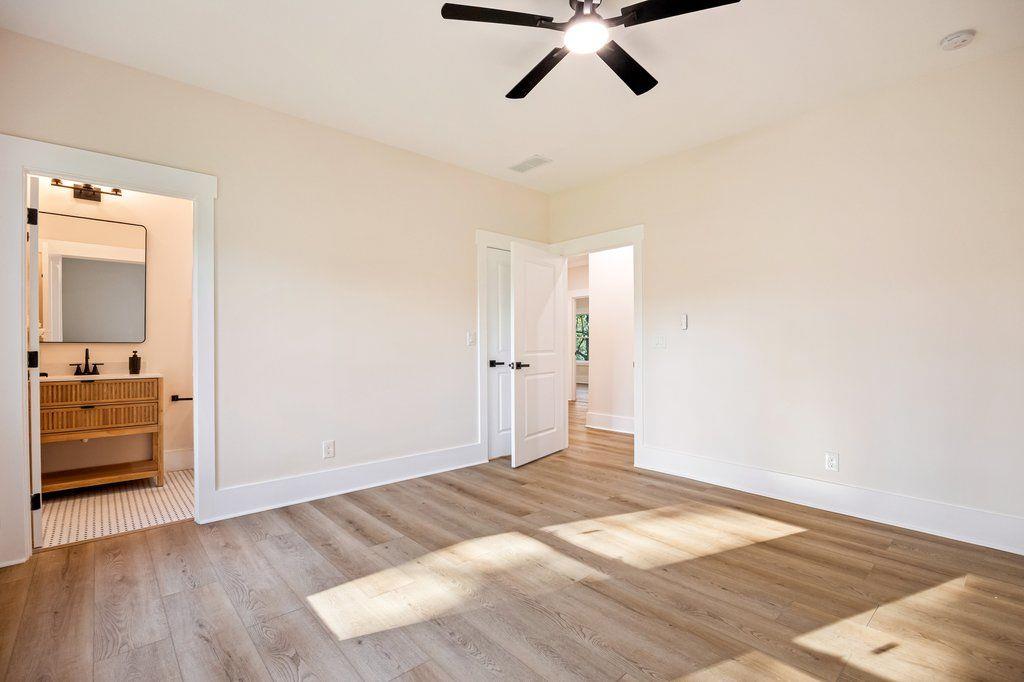 1755 Snapfinger Road Decatur, GA 30032 - Photo 29 of 52 a view of a room with wooden floor cabinet and a bathroom