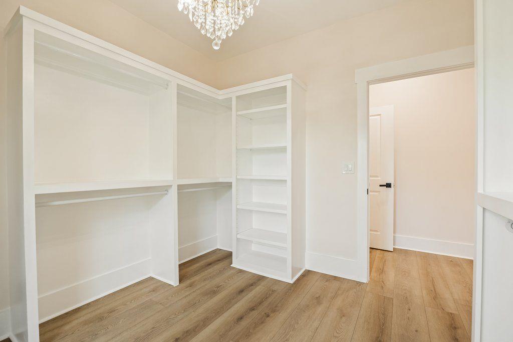 1755 Snapfinger Road Decatur, GA 30032 - Photo 32 of 52 a view of an empty room with wooden floor