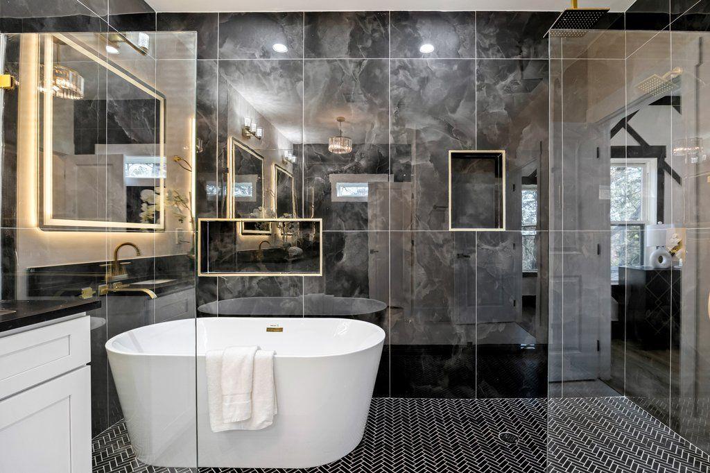 1755 Snapfinger Road Decatur, GA 30032 - Photo 36 of 52 a bathroom with a bathtub and shower