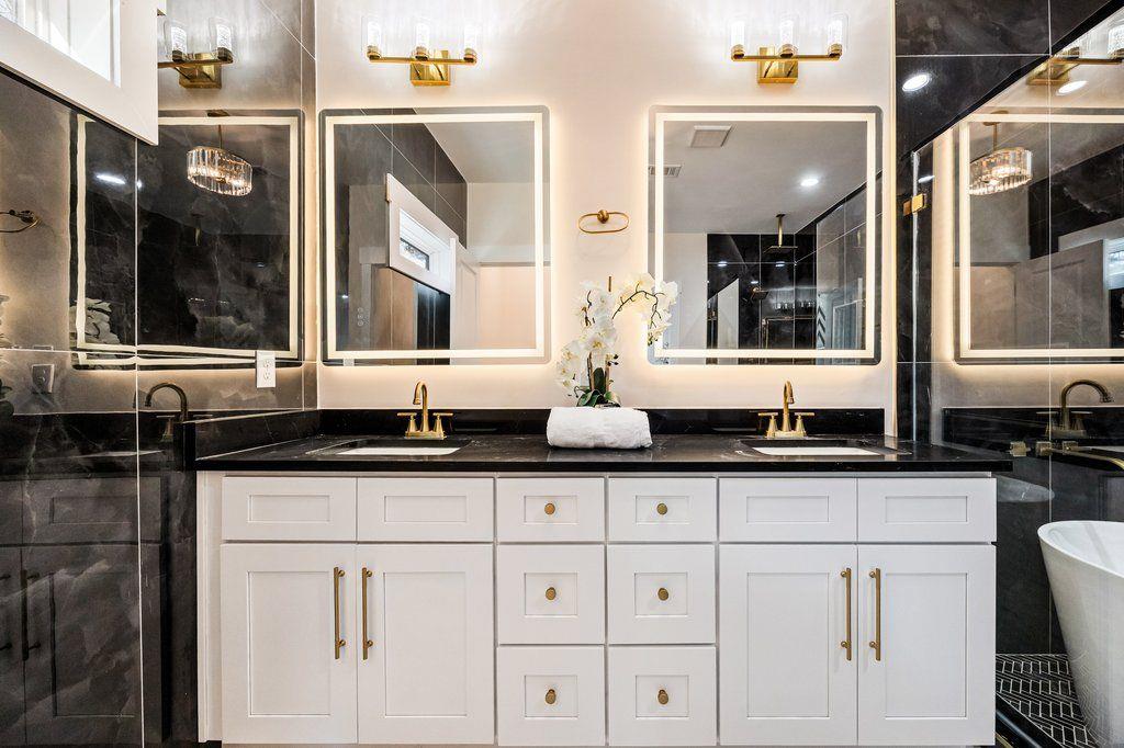 1755 Snapfinger Road Decatur, GA 30032 - Photo 37 of 52 a bathroom with granite countertop a sink and a mirror