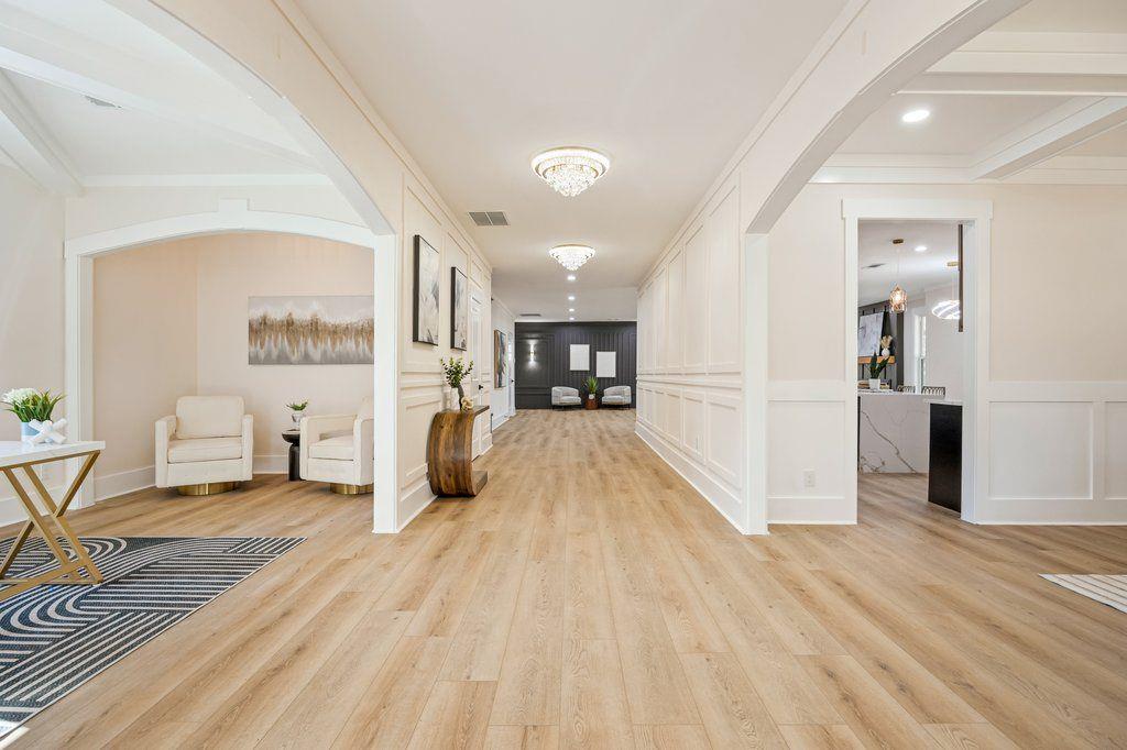 1755 Snapfinger Road Decatur, GA 30032 - Photo 4 of 52 a view of a living room hardwood and kitchen space with wooden floor