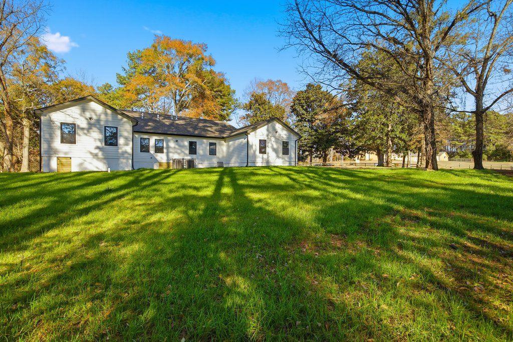 1755 Snapfinger Road Decatur, GA 30032 - Photo 48 of 52 a front view of a house with a yard