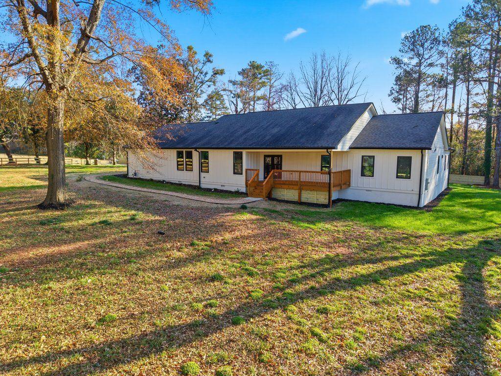 1755 Snapfinger Road Decatur, GA 30032 - Photo 49 of 52 a view of a house with a yard