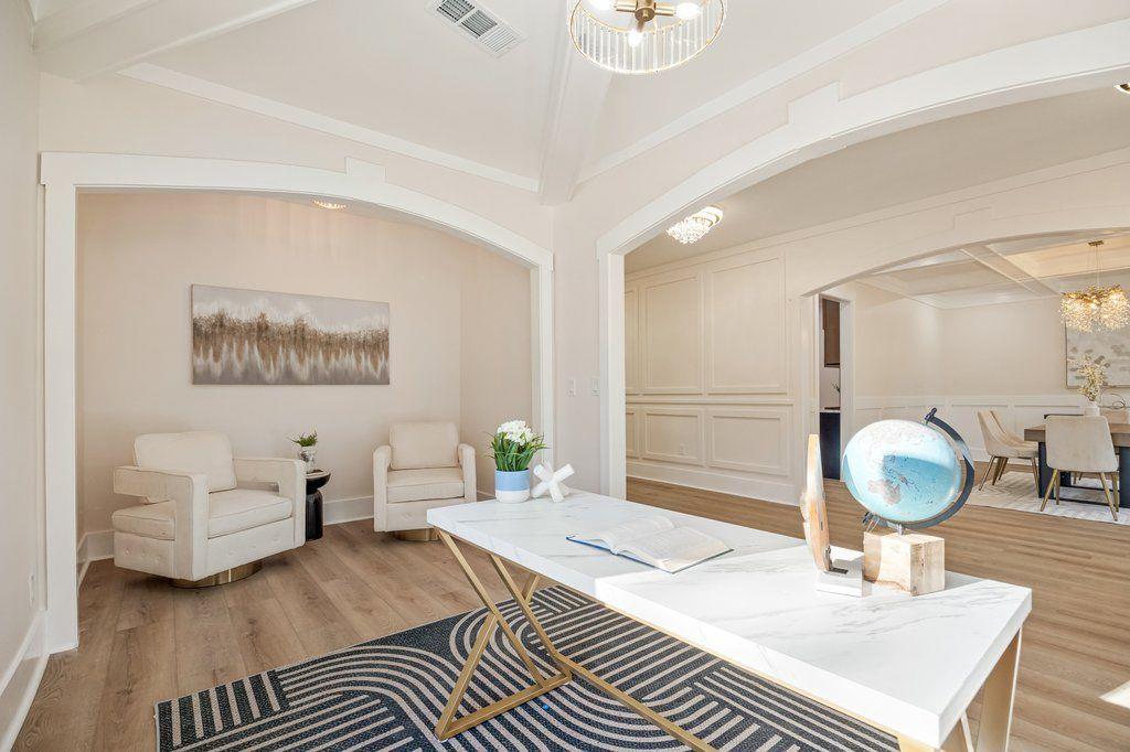 1755 Snapfinger Road Decatur, GA 30032 - Photo 6 of 52 a living room with furniture and a mirror