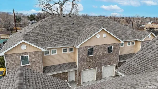 a front view of a house with yard