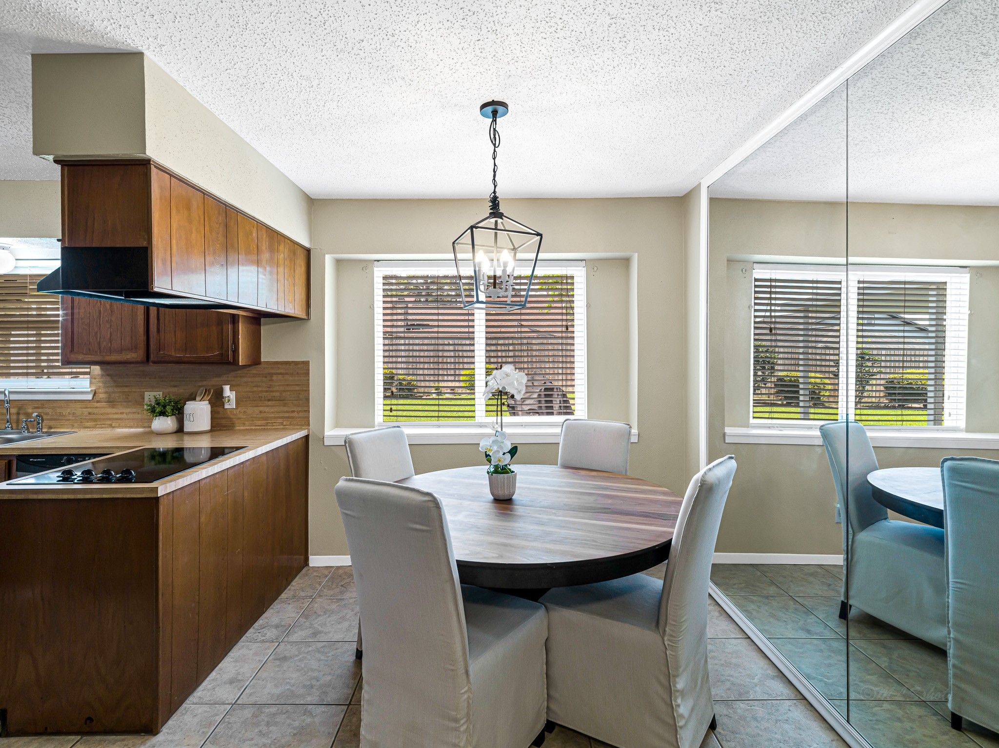 6230 Sunnygate Drive Spring, TX 77373 - Photo 15 of 33 Casual dining features gorgeous window view to the backyard.
