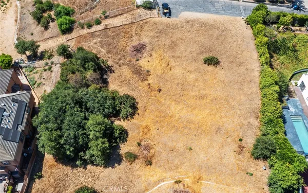 a view of a backyard of a house