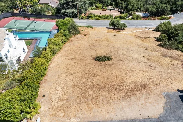 a view of a yard with an ocean view