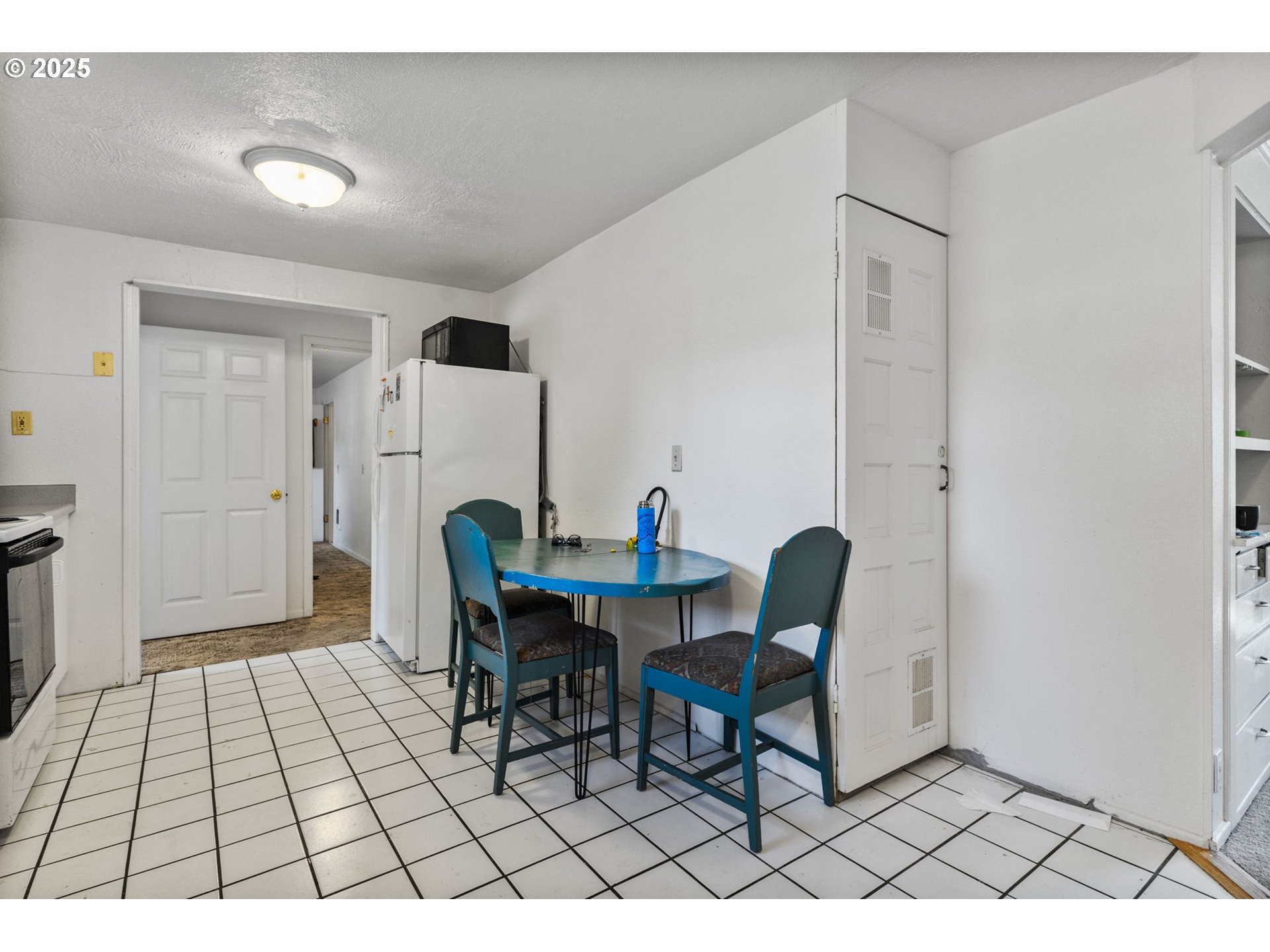 1919 Northwest Buchanan Avenue Corvallis, OR 97330 - Photo 14 of 30 a living room with a table and a rug