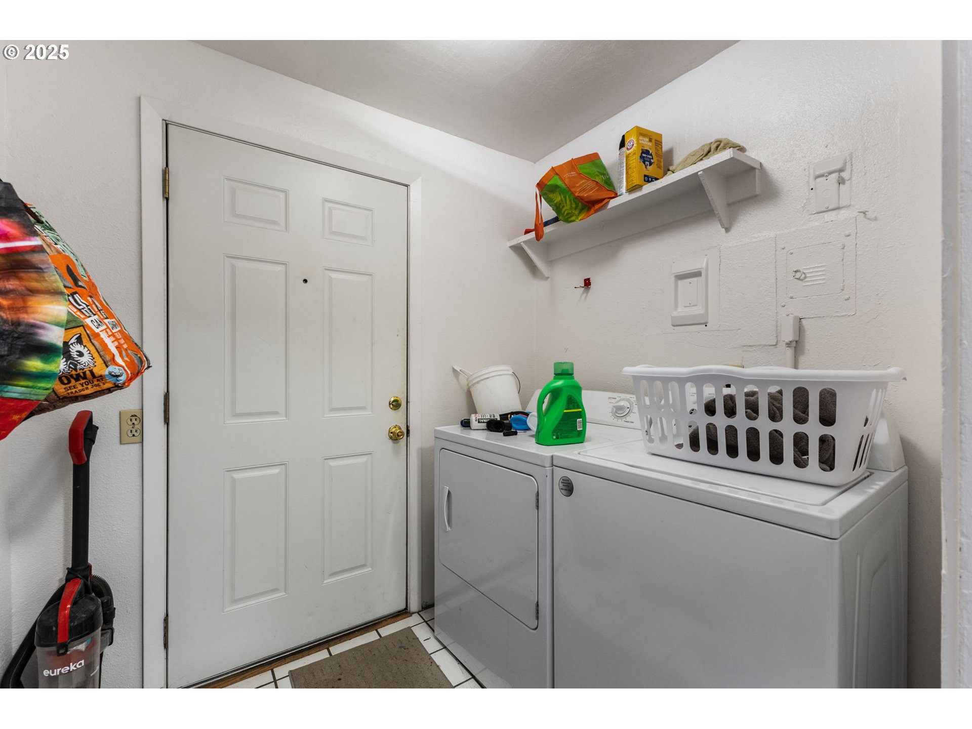 1919 Northwest Buchanan Avenue Corvallis, OR 97330 - Photo 15 of 30 a kitchen with a white cabinets and wooden floor