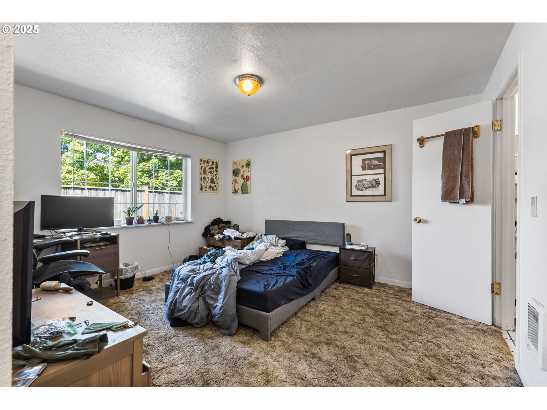 1919 Northwest Buchanan Avenue Corvallis, OR 97330 - Photo 18 of 30 a living room with furniture and a flat screen tv